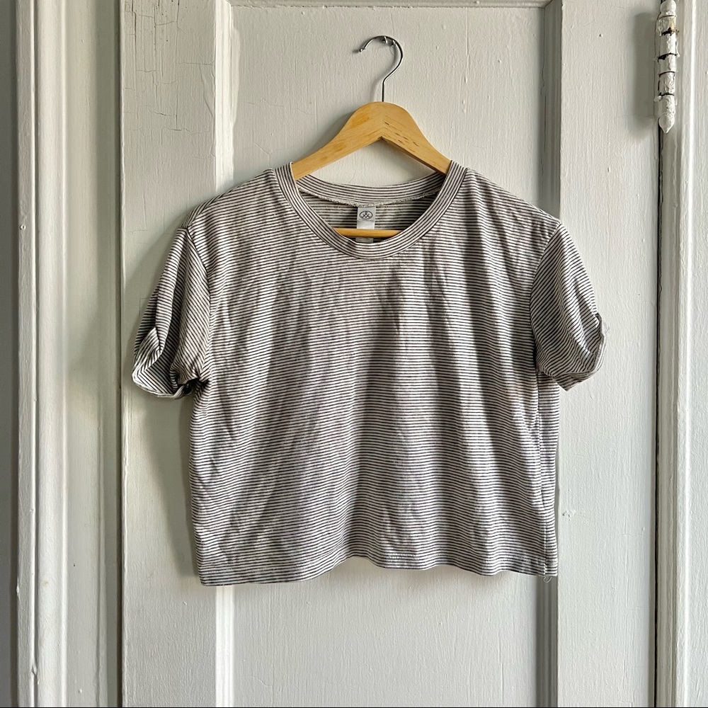 Cropped black and white striped t-shirt.
